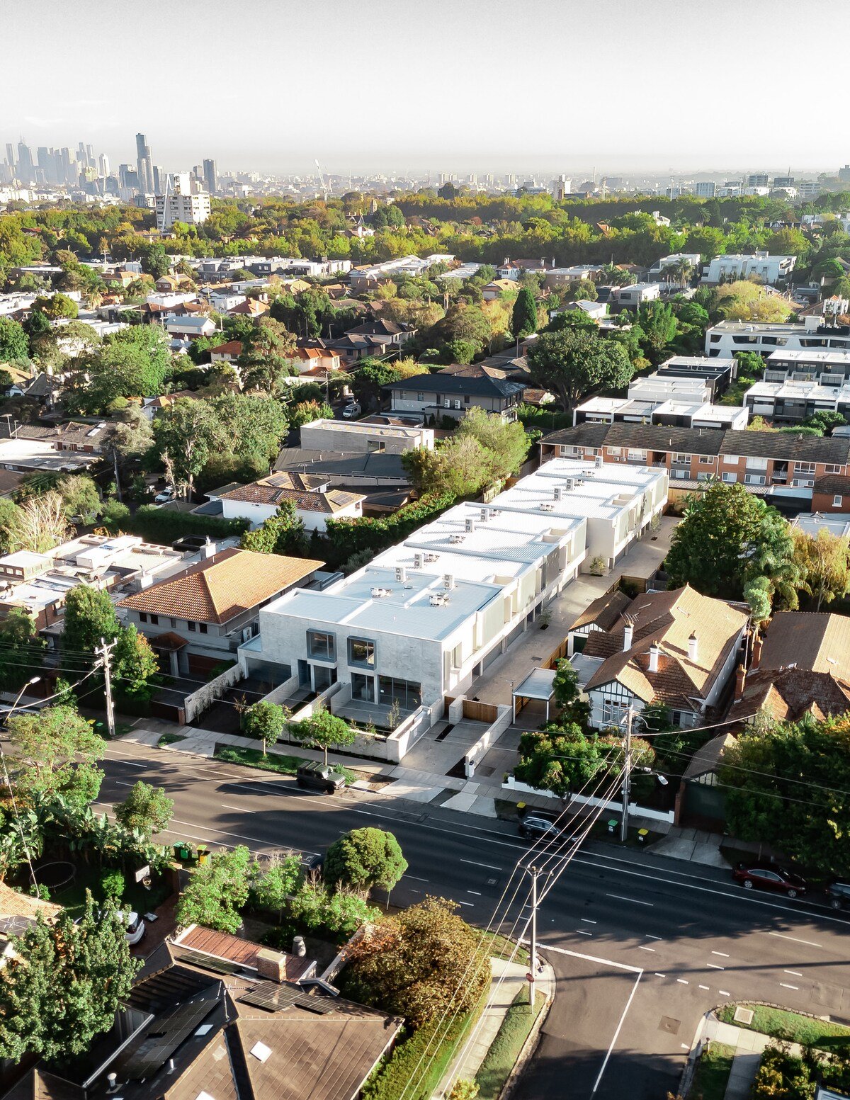 Aerial view of AlmaLuxe with the Melbourne CBD skyline in the background